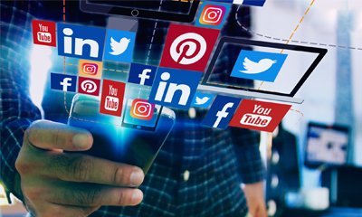 Social Media icons coming out of a mobile phone